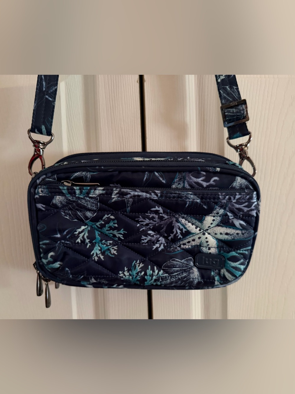 Lug Roundabout Crossbody Bag with Belt Loops and Built- In Wallet